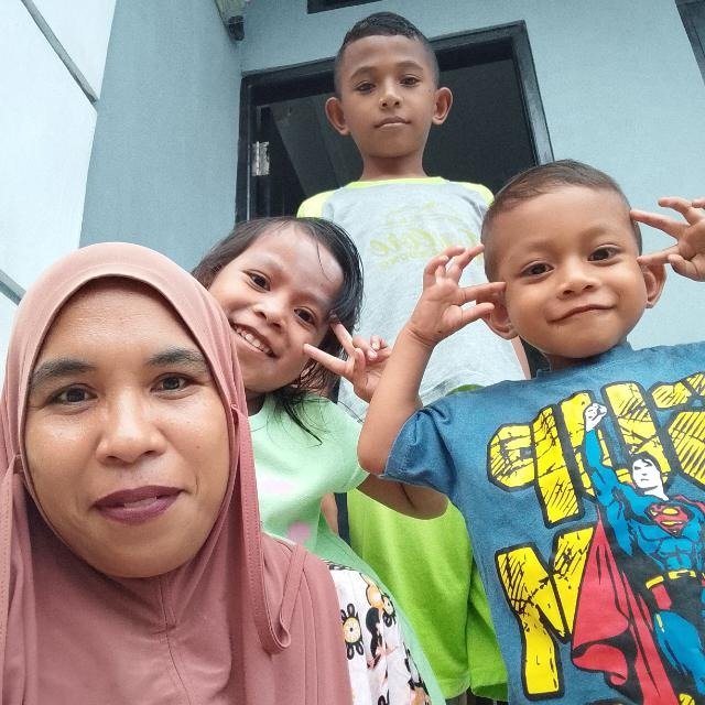 Surni Amin, S.E